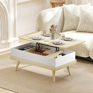 Table basse relevable blanche et bois devant un canapé, plateau relevé pour un repas