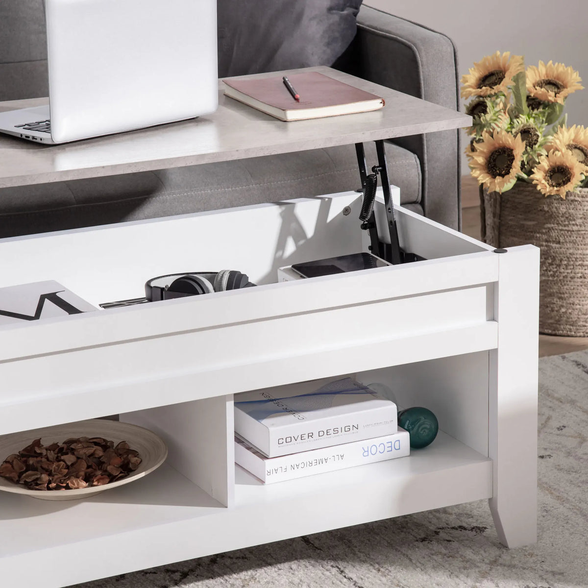 Rangement caché sous le plateau relevé